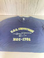 Front view of navy Star Trek T-shirt laid flat showing full graphic