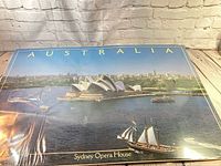 Full poster showing Sydney Opera House photo and AUSTRALIA title