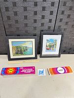 Full lot view: two framed prints, two slide boxes