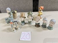 Group shot of all ten porcelain pieces on table