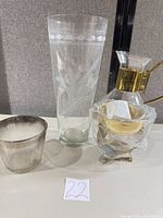 Full view of the three items together: vase, tumbler, coffee server with stand