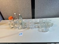 Group shot of all 18 glass items on table