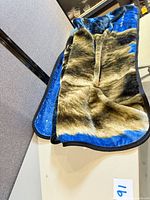 Folded throw showing wolf eyes and fur texture