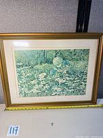 Front view of framed print with measuring tape for scale