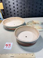 Two planters and lid overall view