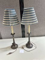 Front view of both lamps showing bases, shades, cords