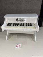 Front view showing full piano and keys