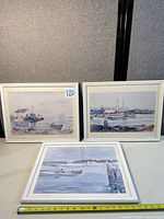 All three framed prints front view with tape measure