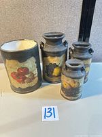 Group shot of four decorative canisters