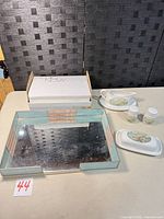 overall lot showing tray, dinnerware pieces and box