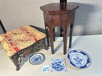Plant stand, footstool, two plates displayed