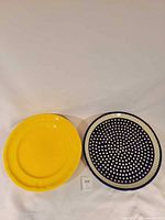 Front view of both platters displaying colors and patterns