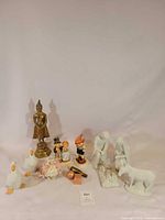 Group shot of all figurines and decor pieces