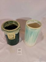 Front view of both crock and vase