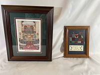 Both framed artworks side by side showing size comparison and frames