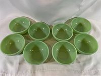 Top view of all eight jadeite bowls displayed