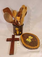 overall lot with crock full of utensils, wood cross and plaque