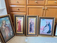 All four framed prints grouped to show quantity and frame style