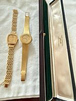 Two gold watches with Toni Cavelti presentation case