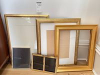 Group shot of all frames leaning against wall
