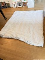 Full view of queen size duvet on floor