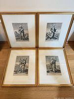 All four framed engravings grouped