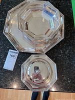 Platter and bowl shown stacked, illustrating size and matching octagonal design