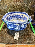 overall view of oval blue and white footbath