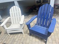 Overall view of both Polywood Adirondack chairs, navy and gray