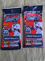 Front view of two sealed 2022 Panini Absolute Football 20-card packs