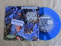 Front view of picture sleeve and blue vinyl record