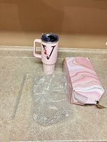 Tumbler, lid, straw, bubble wrap, box