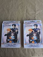 Front view of both boxed sets