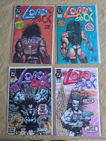 All four Lobo's Back issues #1-4 in bags with boards
