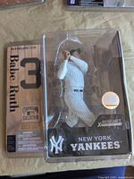 Front view of sealed Babe Ruth action figure in blister packaging