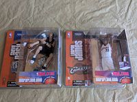 Front view of both sealed figures