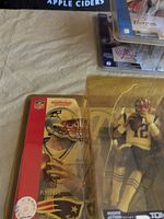 Front view of Tom Brady figure in blister packaging