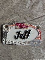 Front view showing Back to the Future design, name Jeff, color details and attachment holes