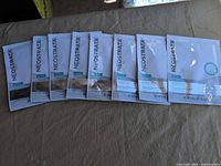 Front view of seven Neostrata sheet mask sachets