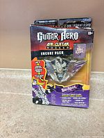 Front of sealed Guitar Hero Air Guitar Rocker Encore Pack