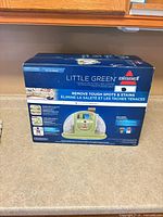 Front of sealed box showing product image and branding