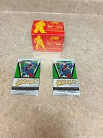 Score 1990 Rookie & Traded sealed box with two Upper Deck 2025-26 MVP sealed packs displayed
