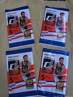 Overview of four sealed Panini Donruss 2020-21 NBA packs