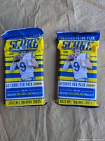 Front view showing two sealed Panini Score 2022 NFL value packs