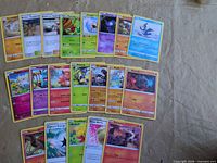 All 19 Pokémon TCG cards laid out in three rows