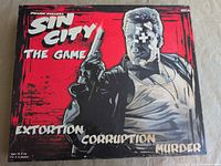Front of Sin City board game box showing title and age/player info