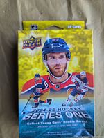 Front of sealed Upper Deck 2024-25 Series One trading card box showing player graphics and 24 cards notation