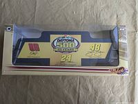 Top view of sealed Daytona 500 50 Years four-car display box showing #88 and #48 numbers