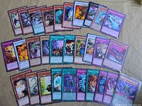 Full spread of all Yu-Gi-Oh! cards in lot showing variety and condition