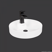 Top view of white round vessel sink with faucet for display